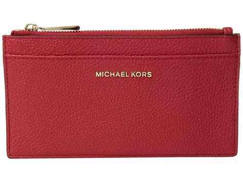 Discover Michael Kors Wallets & card holders for women online